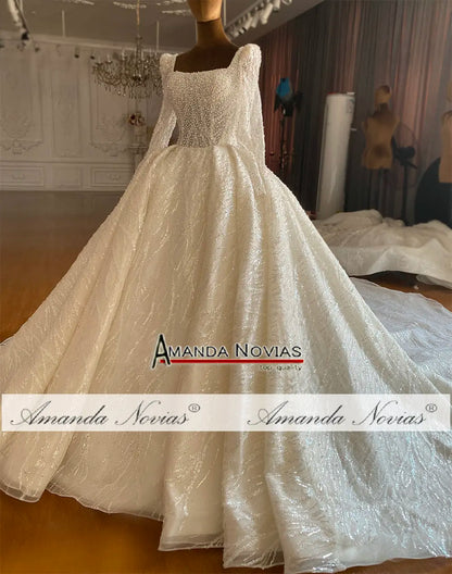 Robe de mariée de luxe en dentelle et perles Amanda Novias NS4763 sur commande personnalisée