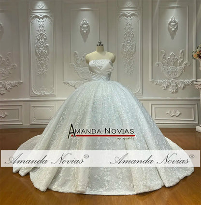 Vestido de novia con lazo de encaje y sin tirantes de Amanda Novias NS4775