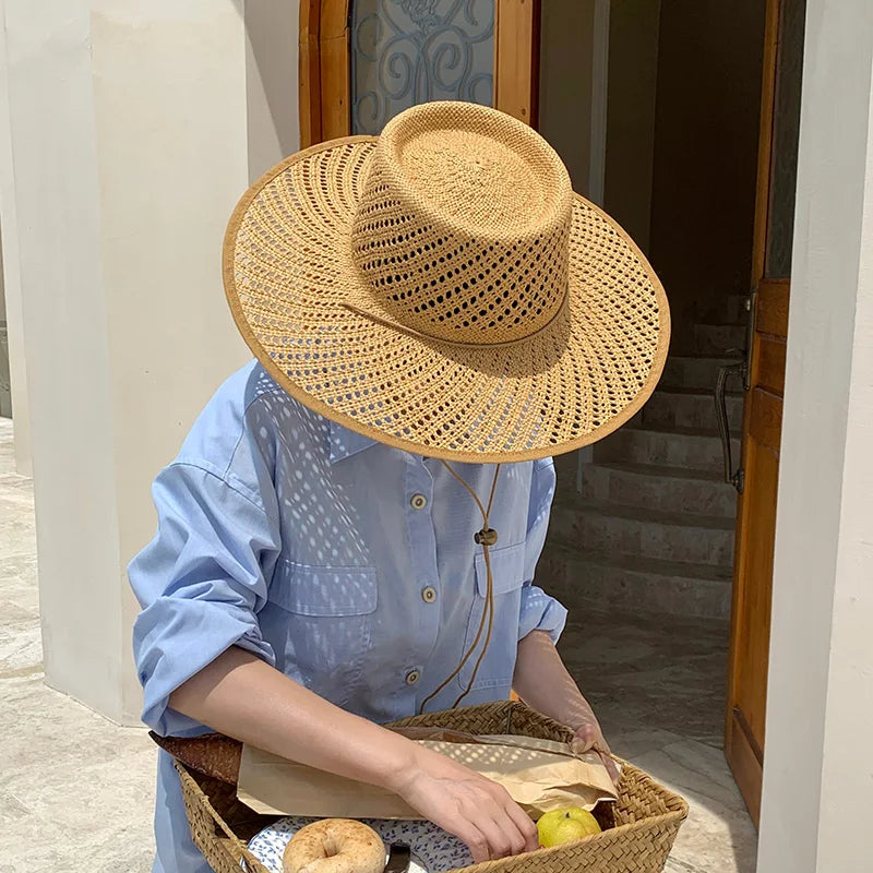 Nuevos sombreros de paja de playa de ala grande hueca de estilo de diseñador para mujeres con correas, sombreros de sol de verano de diseño de moda, sombrero Fedora de Panamá para dama