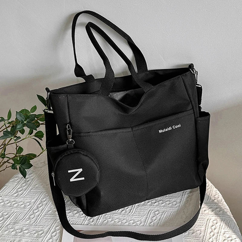 Bolso de mano de nailon para mujer Ins Lazy Wind, nuevo bolso de hombro tipo bandolera impermeable de gran capacidad coreano, sencillo y literario para mujer