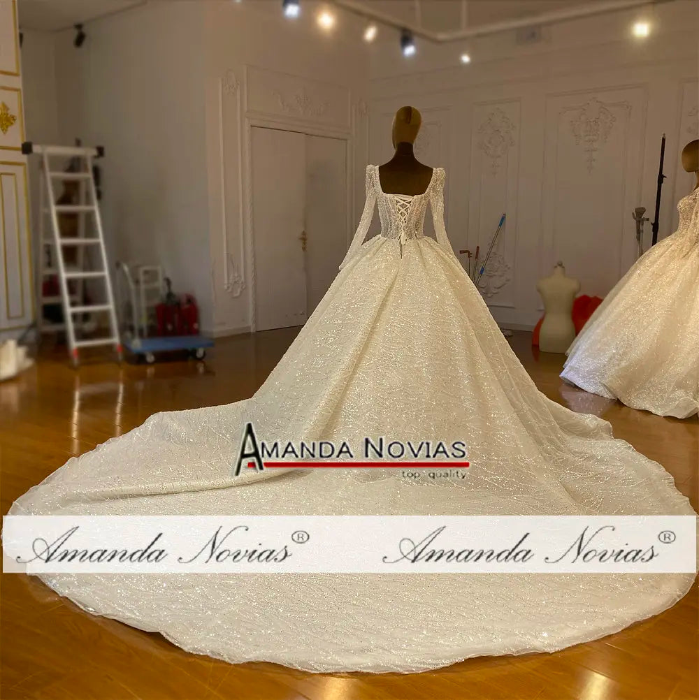 Robe de mariée de luxe en dentelle et perles Amanda Novias NS4763 sur commande personnalisée