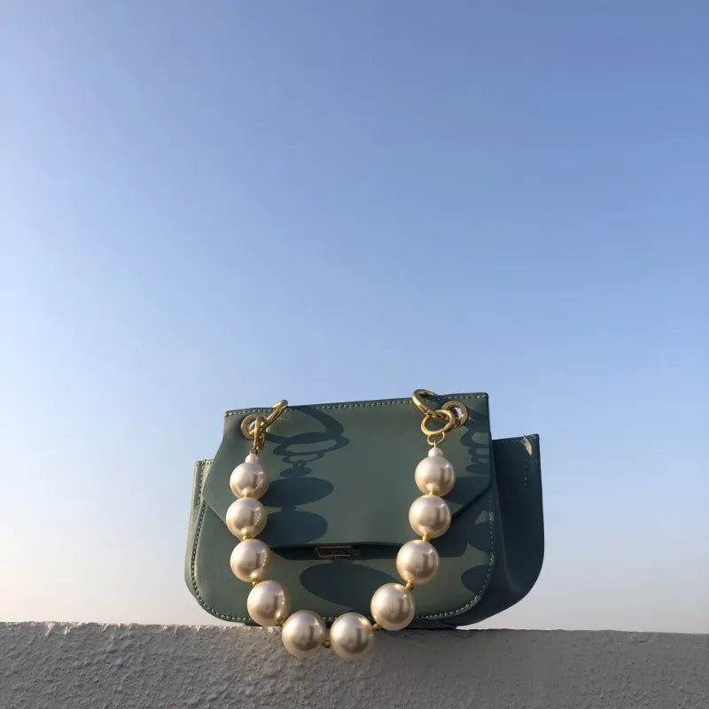 Nuevo bolso de mano exquisito con cuentas de perlas, estilo avanzado, combina con todo, para primavera y verano, para uso diario, minibolsos coreanos, paquete simple para mujeres