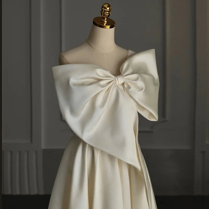 Robe longue élégante de soirée pour femme, tenue de soirée, de bal, d'invité, sexy, asymétrique, épaule dénudée, gros nœud, robe longue d'anniversaire, de remise de diplôme, été 2023