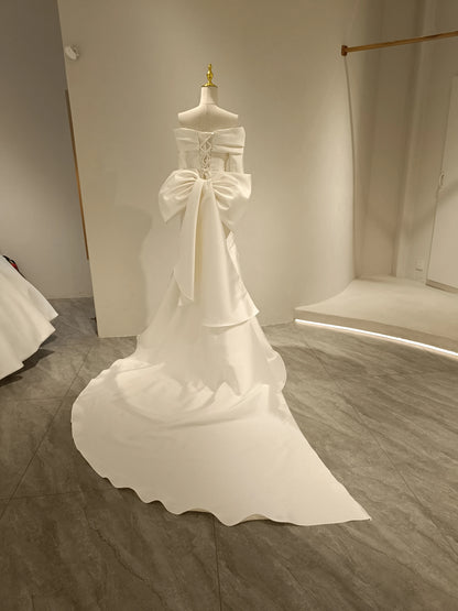 Robe de mariée sirène à manches longues et traîne avec nœud amovible en mikado