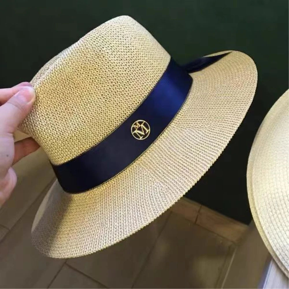 2024 Nuevo sombrero de paja de diseño de estilo europeo y americano para mujer, sombrero para el sol con letras huecas, sombrero para el sol de moda