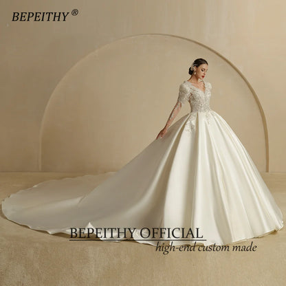 BEPEITHY Robe de mariée de luxe à col en V pour femmes 2022 Train chapelle Dos ouvert Sexy Manches longues Robe de mariée princesse