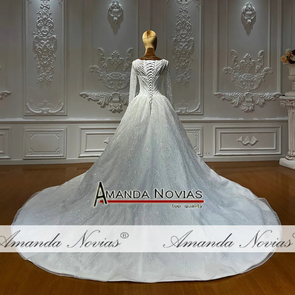 Vestido de novia con encaje y cuentas en forma de A de Amanda Novias NS4744