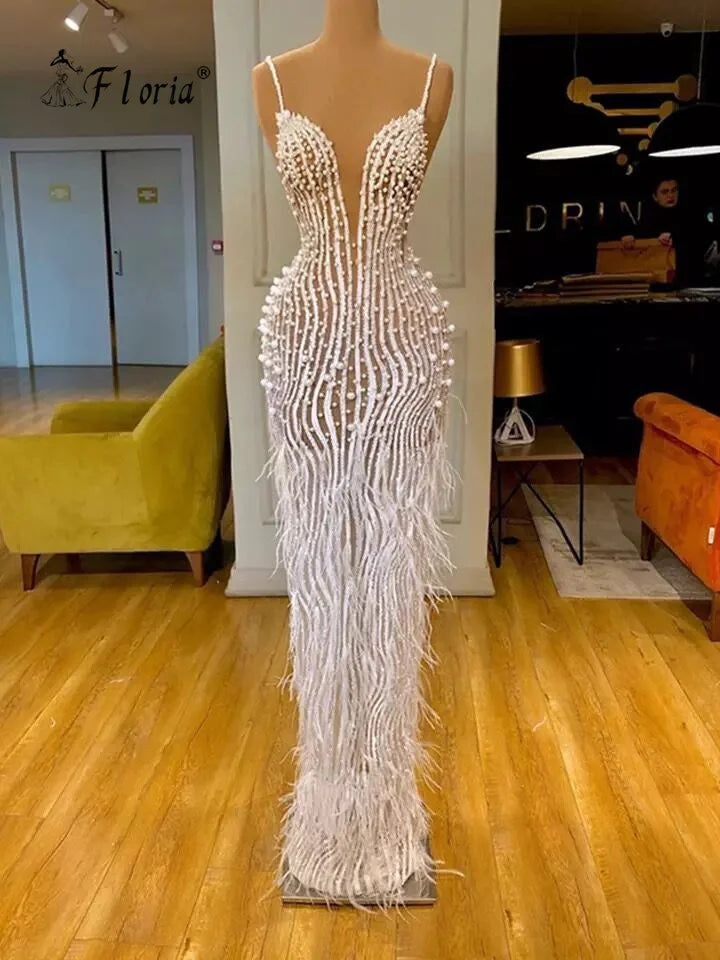 Elegant Full Pearls Mermaid Evening Dress White Spaghetti Strap Feathers Floor Length See Through Prom Dress Robe De Soiree