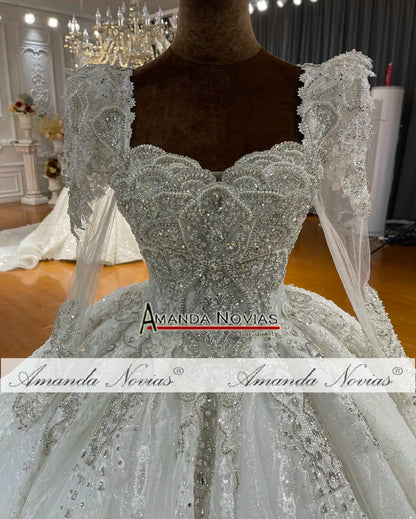 Vestido de novia de manga larga con escote corazón de Amanda Novias NS4725