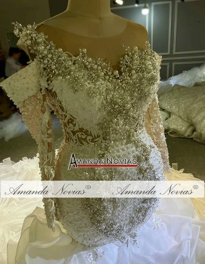 Robe de mariée sirène à manches longues et volants en cristal 3D Amanda Novias NS4776