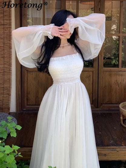 Horetong Elegant Maxi Dresses For Women White Off Shoulder Puff Long Sleeve Elastic High Waist Party Gown Ruffle Holiday Dress