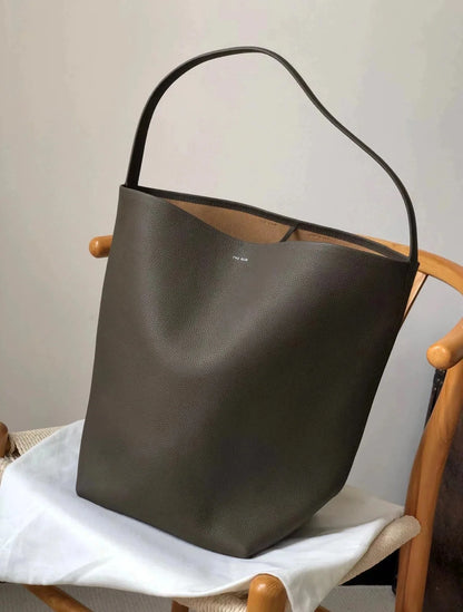 2024 Nuevo bolso tipo cubo para mujer, bolso de hombro para personas mayores, de piel de vaca con grano de lichi, bolso de mano de gran capacidad para mujer