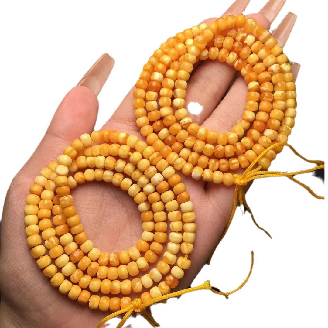 Collar y pulsera de varias vueltas con cuentas de Buda hechas de cera de abejas natural