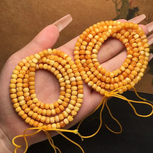 Collar y pulsera de varias vueltas con cuentas de Buda hechas de cera de abejas natural