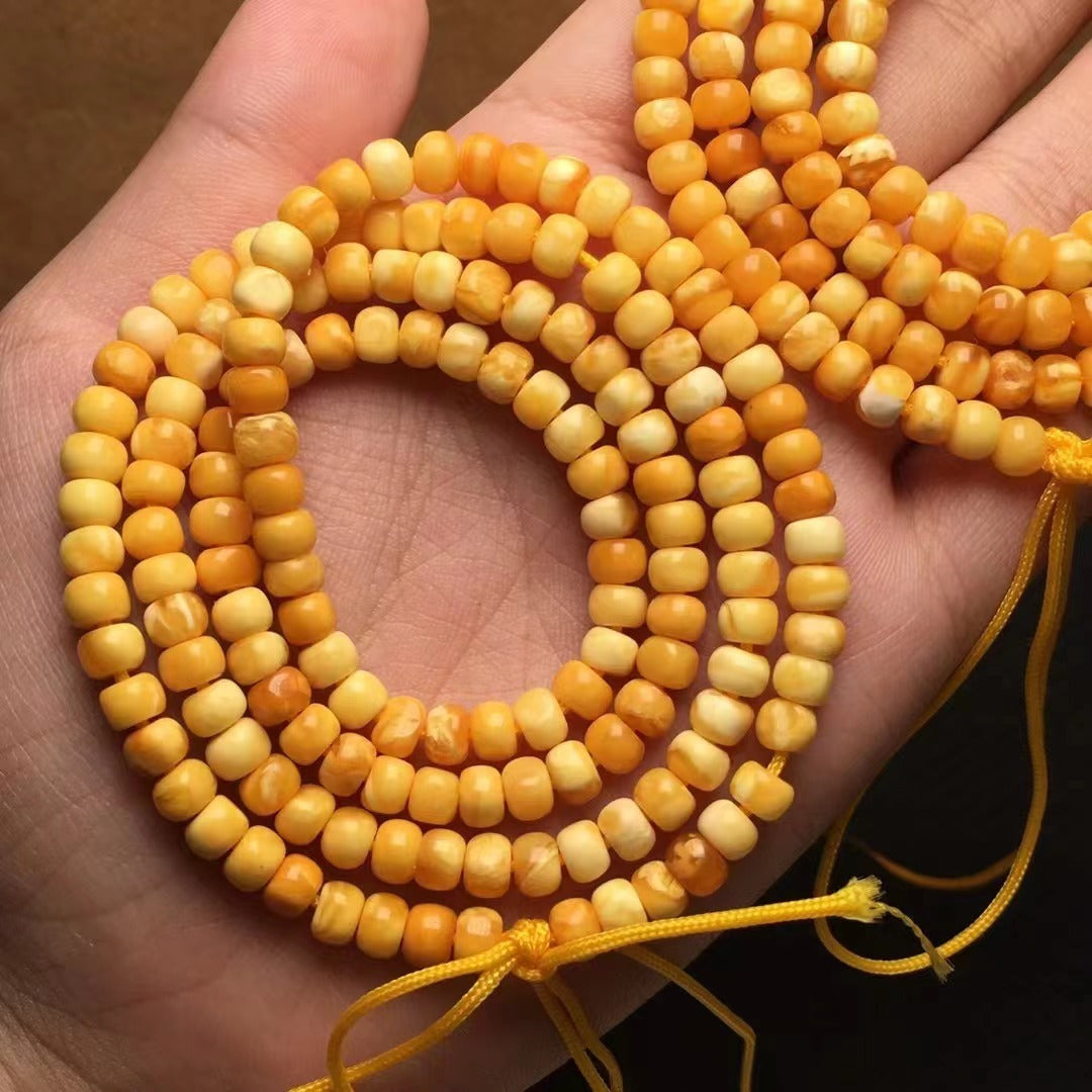 Collier et bracelet multi-tours en perles de Bouddha en cire d'abeille naturelle